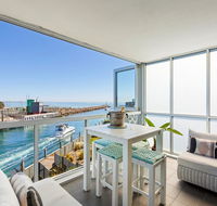 Azure Bliss Family escape opposite beach with heated pool access